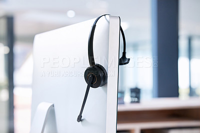 Buy stock photo Empty office, computer or call center headset for communication for telecom customer services. Help desk, background or crm workplace for technical support, telemarketing sales or consulting job 