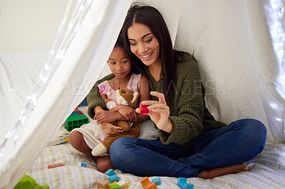 Buy stock photo Tent, home and mother play with girl for bonding, quality time and child development at home. Family, relax and happy mom with child playing with educational toys, building blocks and shapes on floor