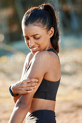 Buy stock photo Fitness, runner or girl with arm injury in fitness training, workout emergency or running exercise in park. Bruised, shoulder pains or tired woman athlete with bad triceps muscles accident in nature