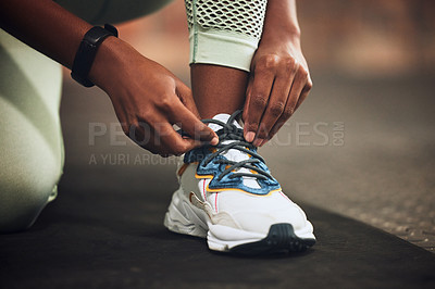 Buy stock photo Lace, gym or hands of person with shoes at gym for training, exercise or workout motivation in fitness center. Tie, closeup or legs of girl sports athlete with footwear ready to start exercising 