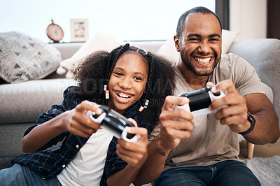 Buy stock photo Gaming, family or children with a father and daughter in the living room of their home playing a video game together. Kids, happy or fun with a gamer dad and girl child in the house to play online