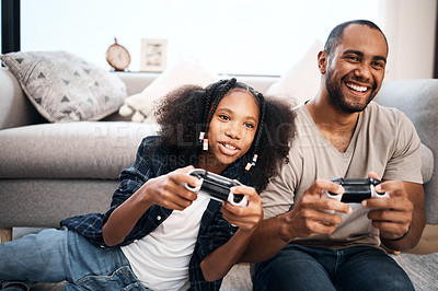 Buy stock photo Video game, family or kids with a dad and daughter in the living room of their home playing or gaming together. Children, happy or fun with a gamer father and girl child in the house to play online