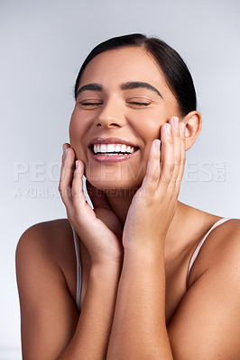 Buy stock photo Happy, beauty and woman with self care of skincare, dermatology and mockup in studio background. Confidence, model and girl with glow on skin from cosmetics, facial or healthy texture on face