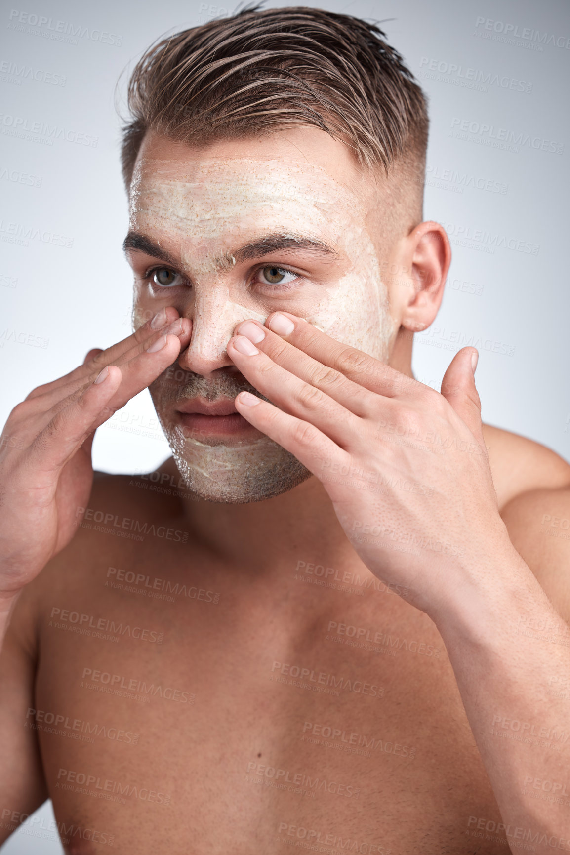 Buy stock photo Healthy, man and face mask in studio with cream for dermatology, skincare or treatment on gray background. Male person, cosmetics, with lotion for grooming, wellness routine or facial product