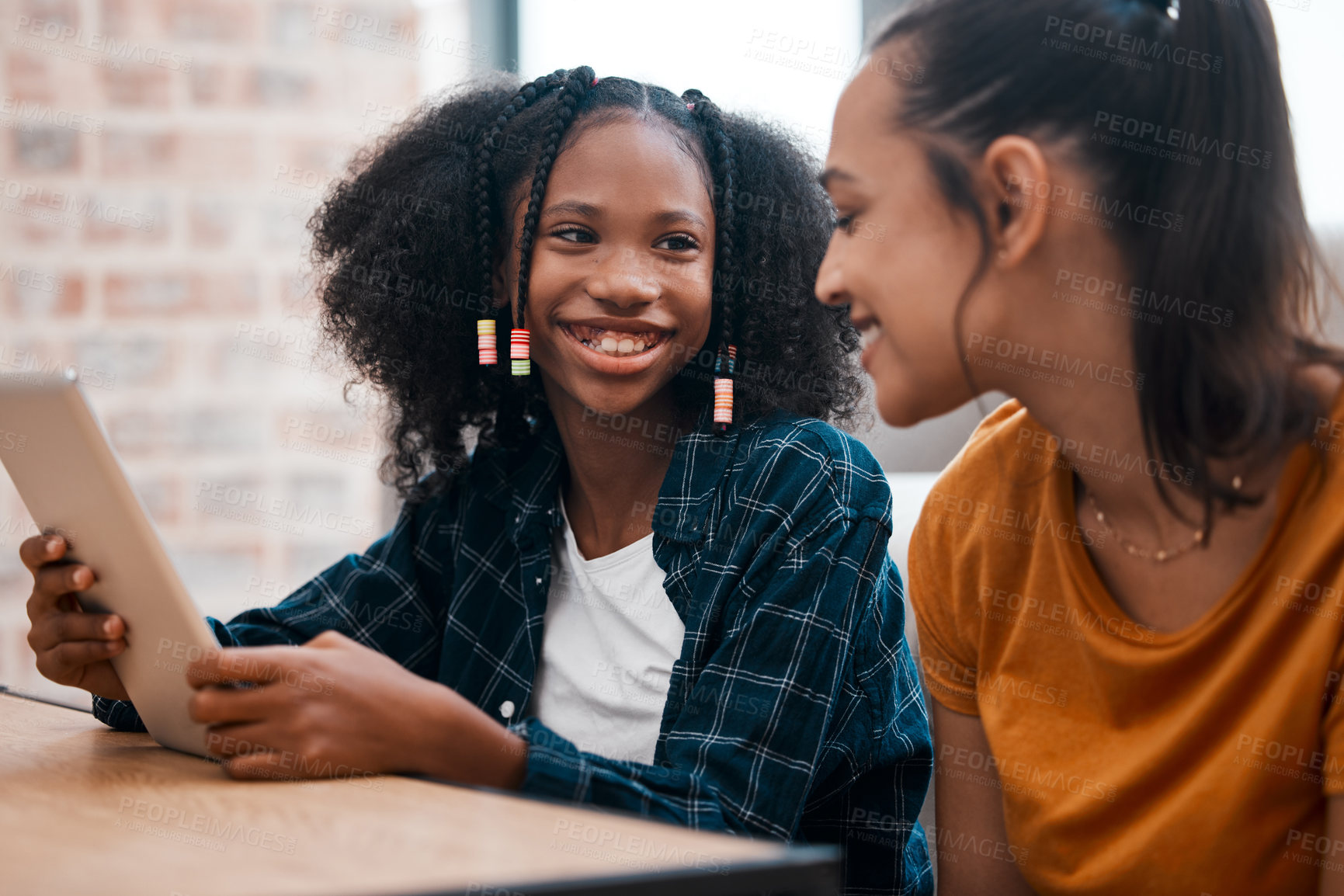 Buy stock photo Child, smile and woman and with tablet at house for acceptance at private school, scholarship and education. Happy, study and girl on sofa with positive news, email and online learning for knowledge