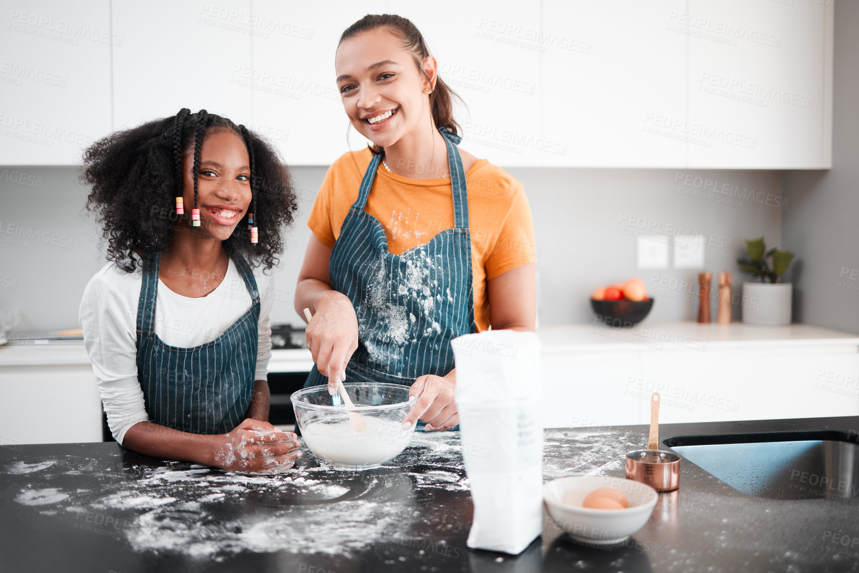 Buy stock photo Mother, daughter and mixing bowl in portrait, baking and flour ingredients for food preparation. Mama, girl and learning dessert or cake and pastry recipe, teaching and child development in home