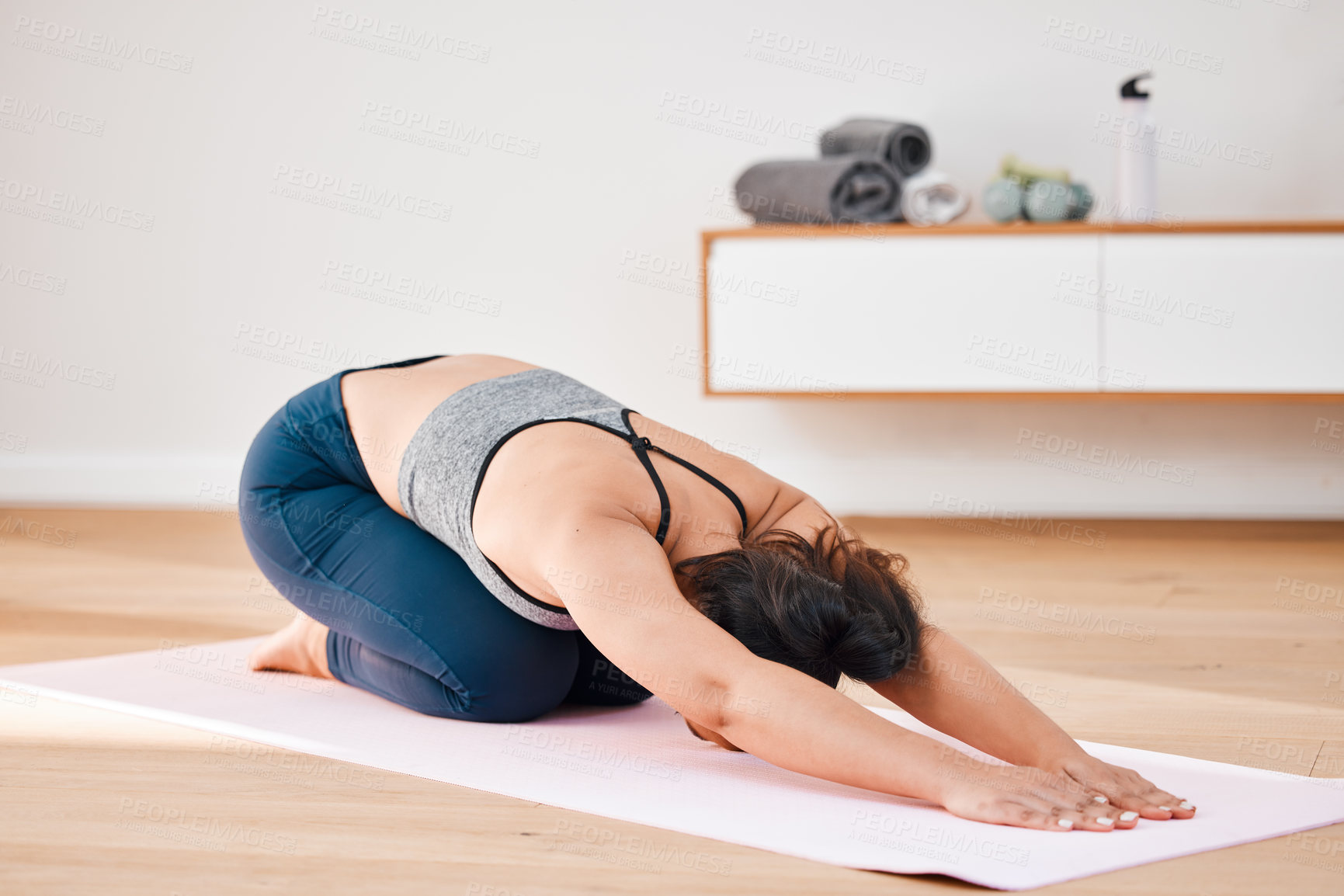 Buy stock photo Spine, yoga or woman in house for stretching, wellness or body flexibility in zen studio for peace. Calm, child pose or female person on mat for mindfulness, meditation or balance in pilates session