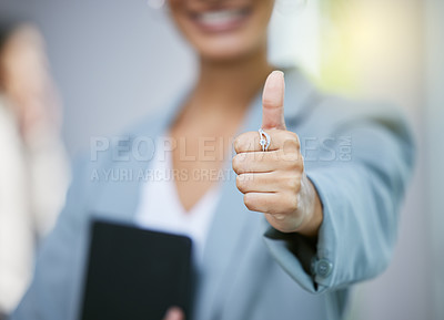 Buy stock photo Shot of an unrecognizable businesswoman showing a thumbs up