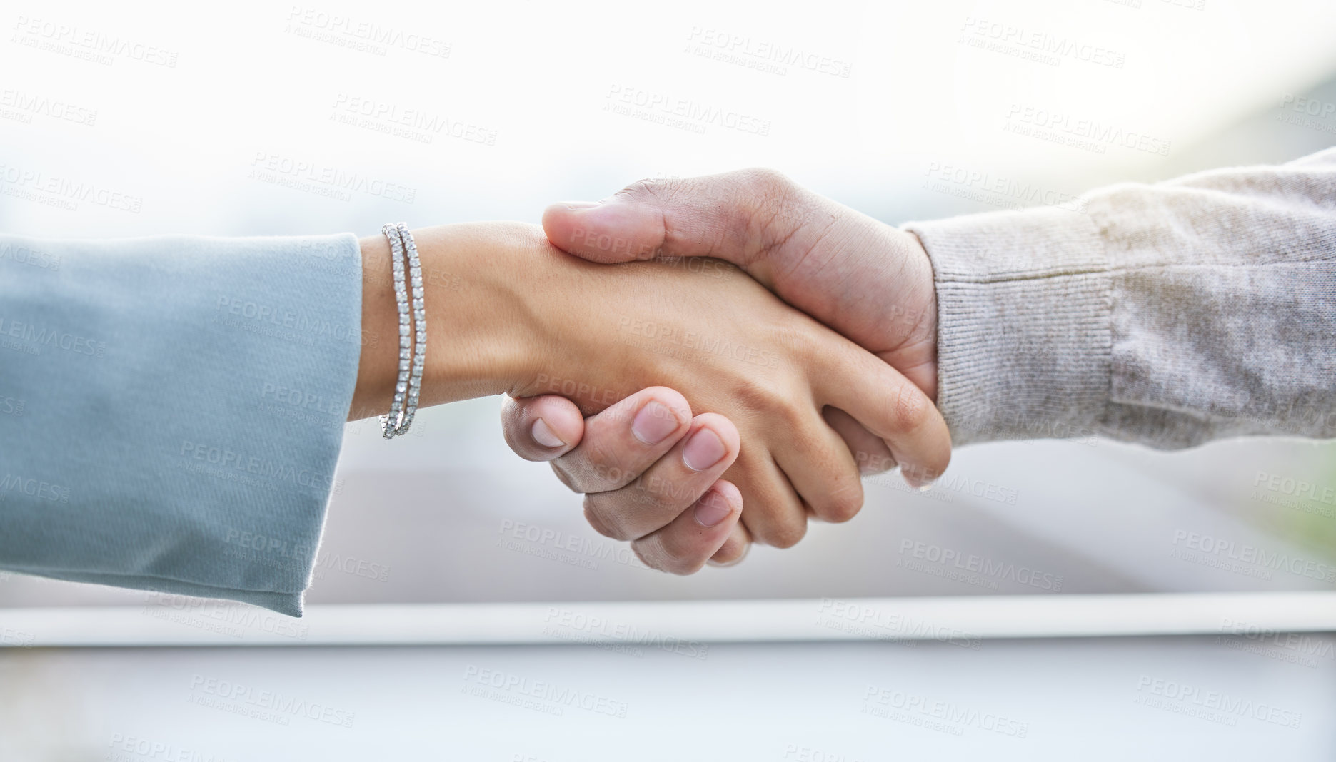 Buy stock photo Shot of two unrecognizable businesspeople shaking hands