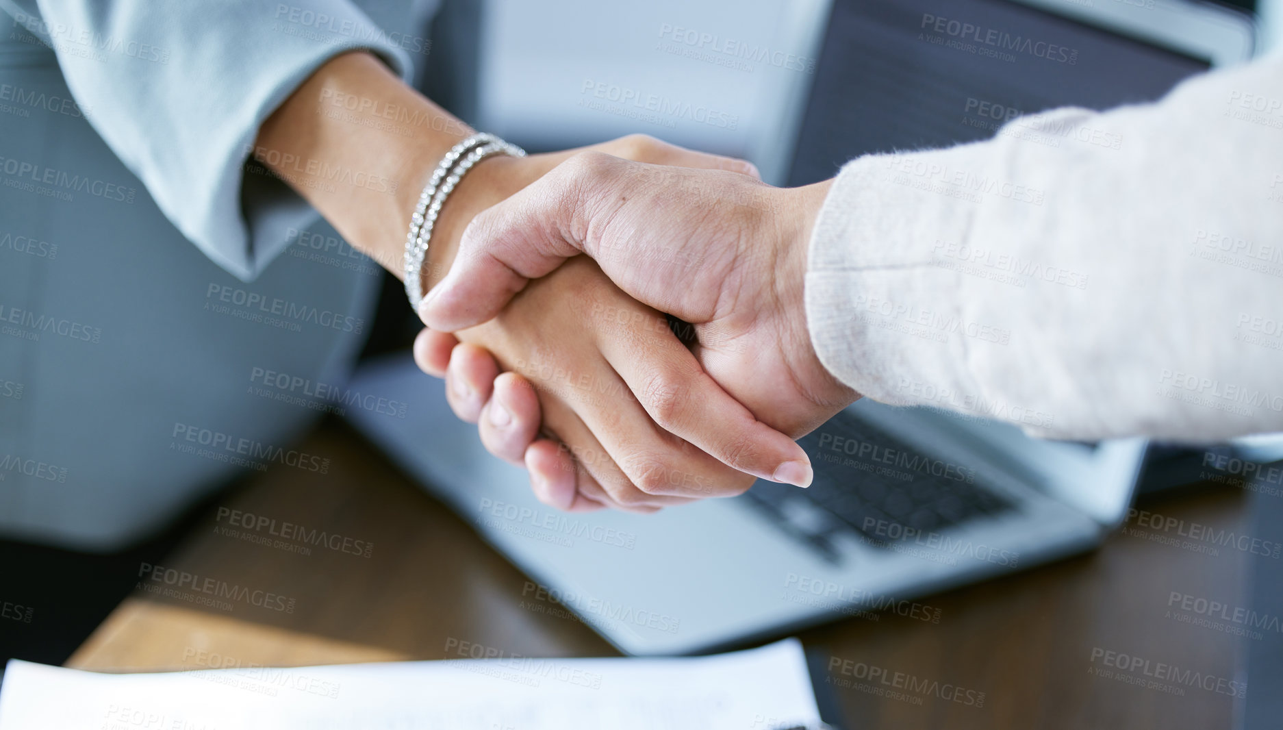 Buy stock photo Shot of two unrecognizable businesspeople shaking hands