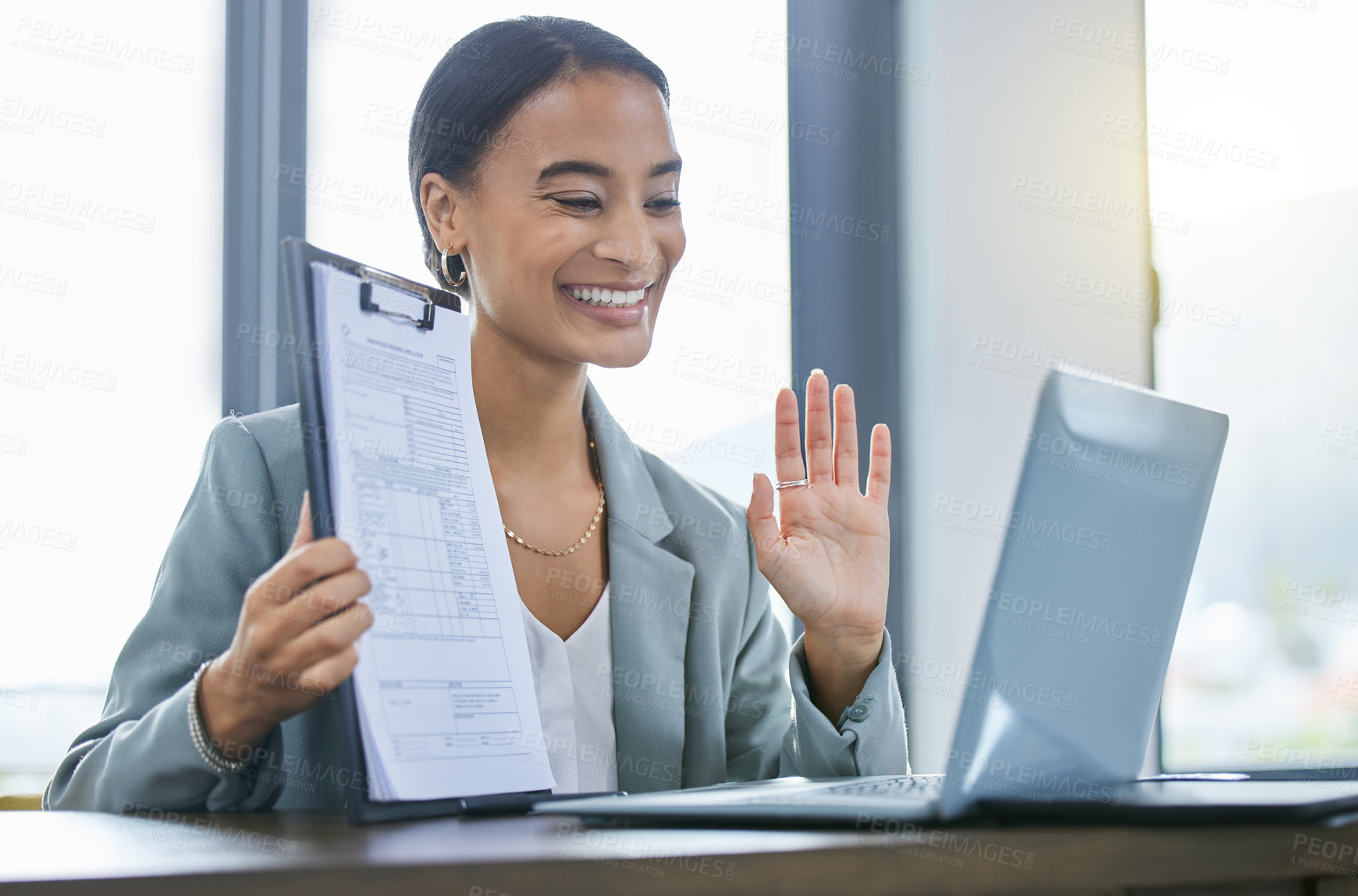 Buy stock photo Clipboard, laptop for video call and wave of businesswoman greeting in office for virtual meeting. Computer, smile and webinar with happy corporate professional with feedback or review paperwork