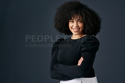 Buy stock photo Shot of a young businesswoman against a studio background