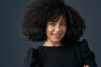 Buy stock photo Shot of a young businesswoman against a studio background