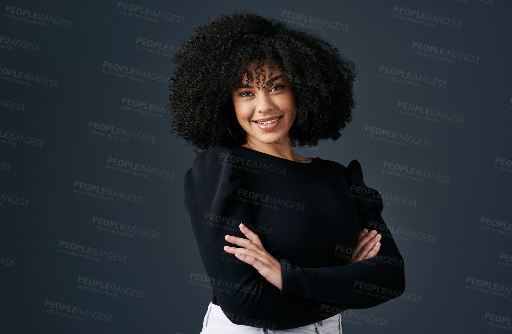 Buy stock photo Shot of a young businesswoman against a studio background