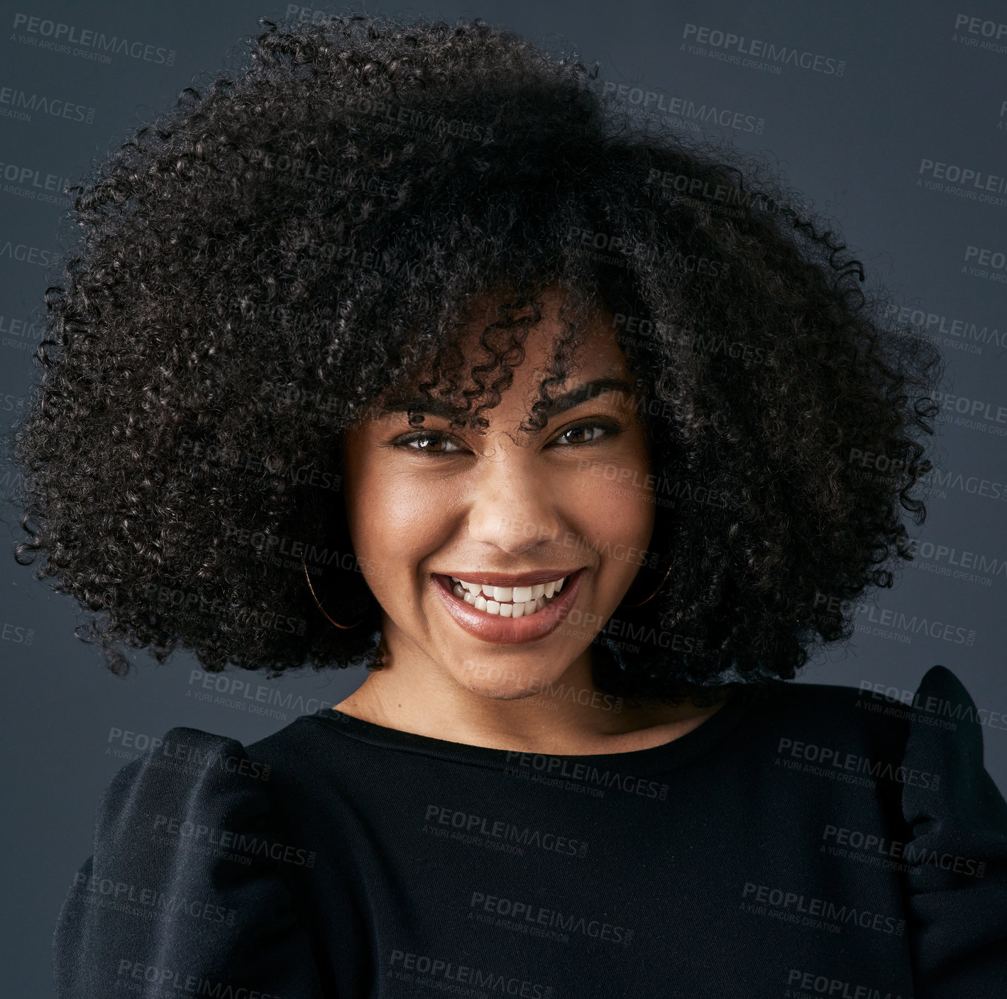 Buy stock photo Shot of a young businesswoman against a studio background