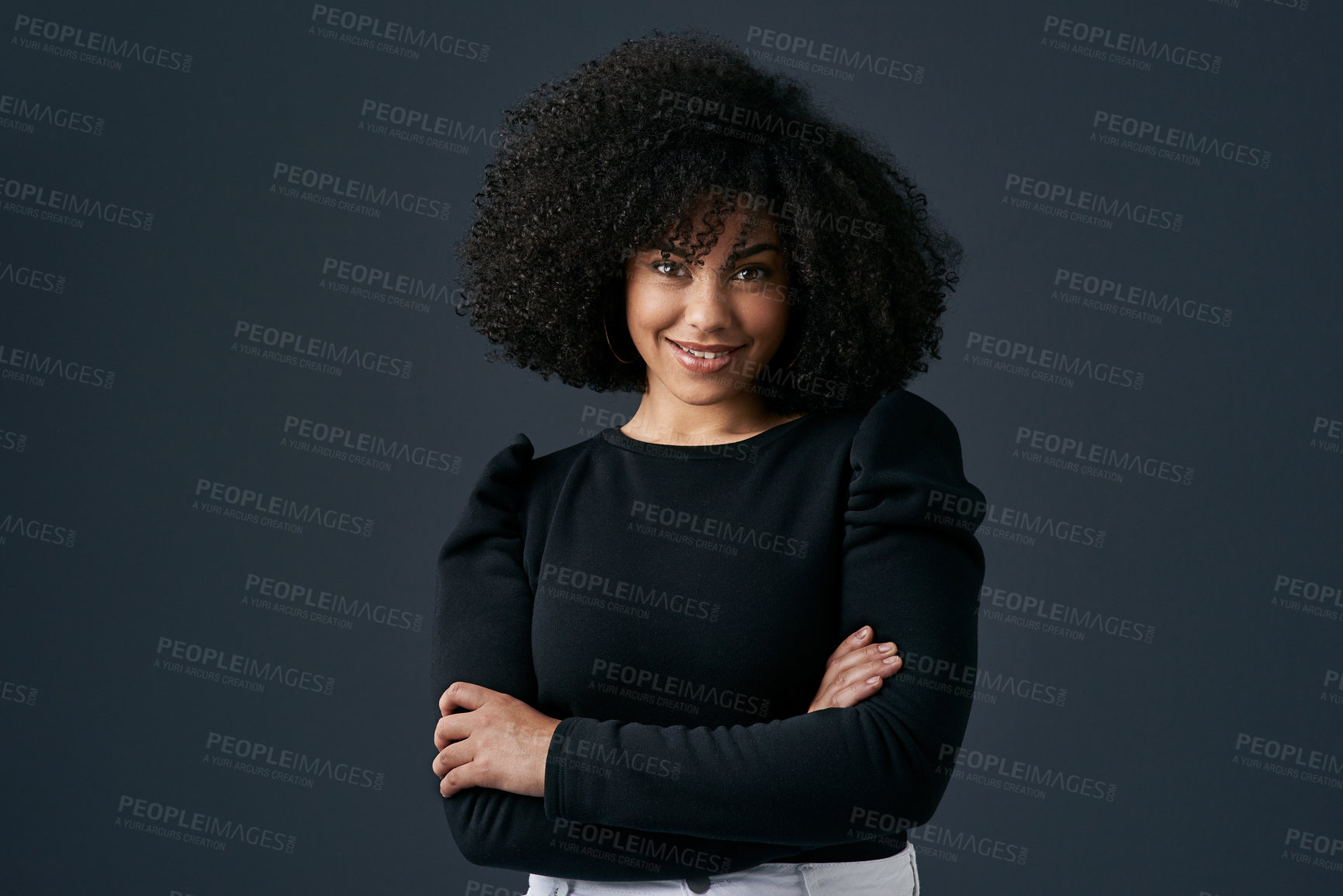 Buy stock photo Shot of a young businesswoman against a studio background