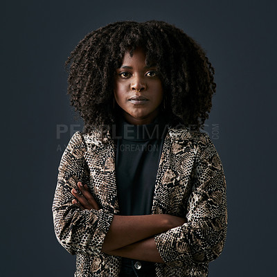 Buy stock photo Shot of a young businesswoman against a studio background