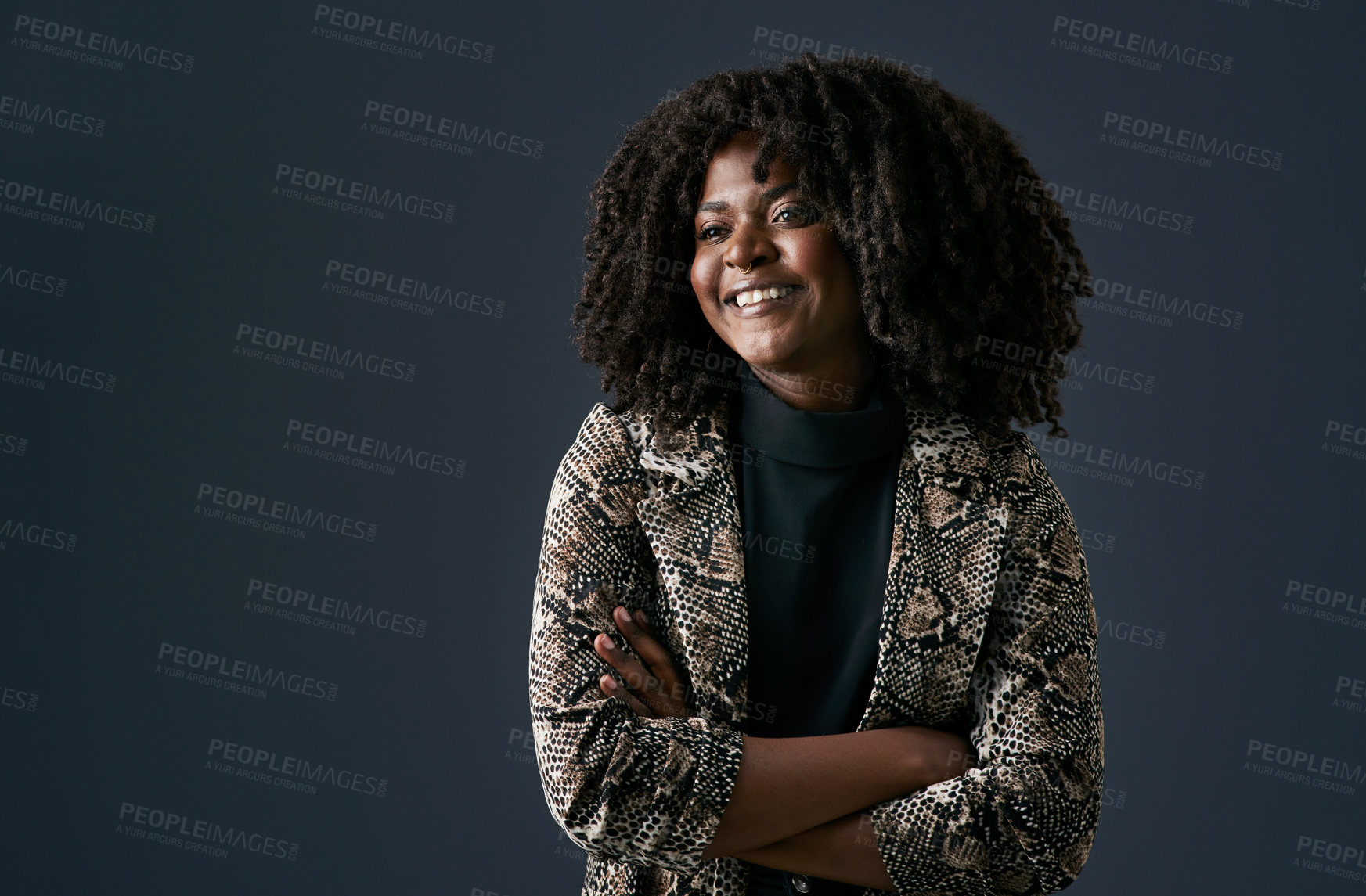 Buy stock photo Shot of a young businesswoman against a studio background