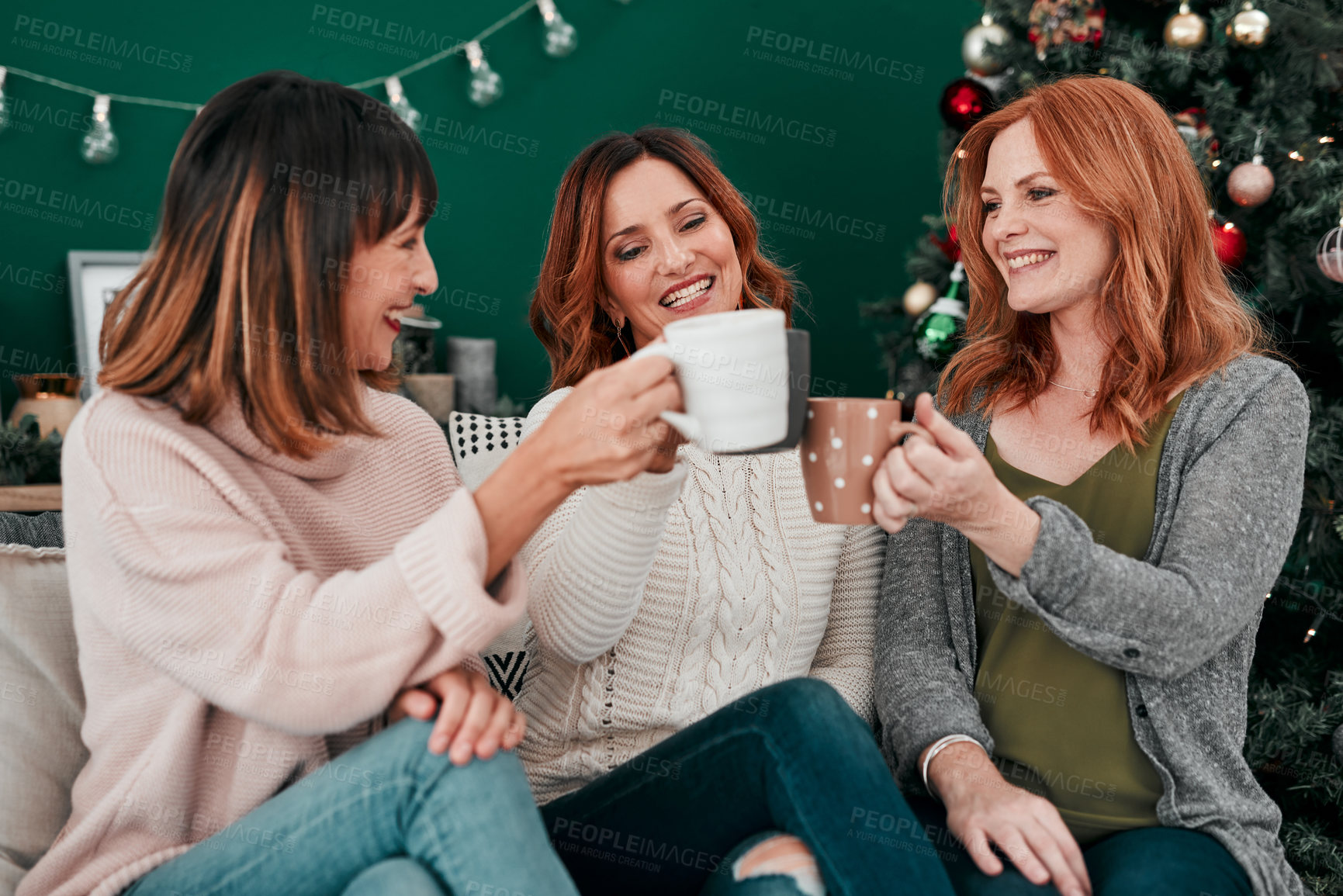 Buy stock photo Coffee, cheers and women on couch with smile for celebration, holidays and reunion in home. Friends, Christmas and together in living room for vacation, connection and toast with tea in apartment