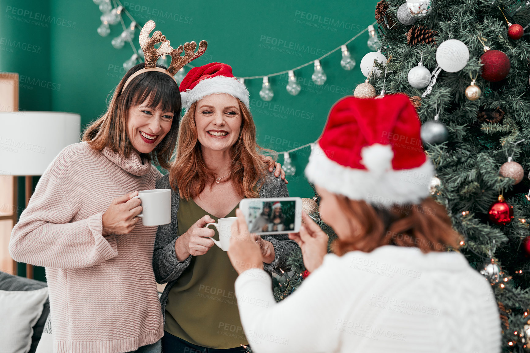 Buy stock photo Family, happy and home picture for christmas with coffee, celebration hug and festive season. People, holiday tea time for togetherness and cozy for nostalgia, smile for vacation in lounge and love