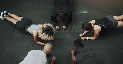 Buy stock photo Top view, fitness and people do push up in circle in gym for training, exercise and workout class. Teamwork, body builder and men and women in sports club for challenge, wellness or strength on floor