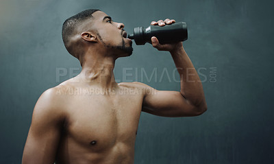 Buy stock photo Fitness, man and drinking water on wall background after workout, exercise and training at a gym. Bottle, hydration and male relax after cardio, bodybuilding or challenge at sports center with space