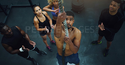 Buy stock photo Man, rope and climbing in gym with friends, applause and motivation in training for strong muscle. Personal trainer, group or people with exercise, workout and support with coaching at fitness club