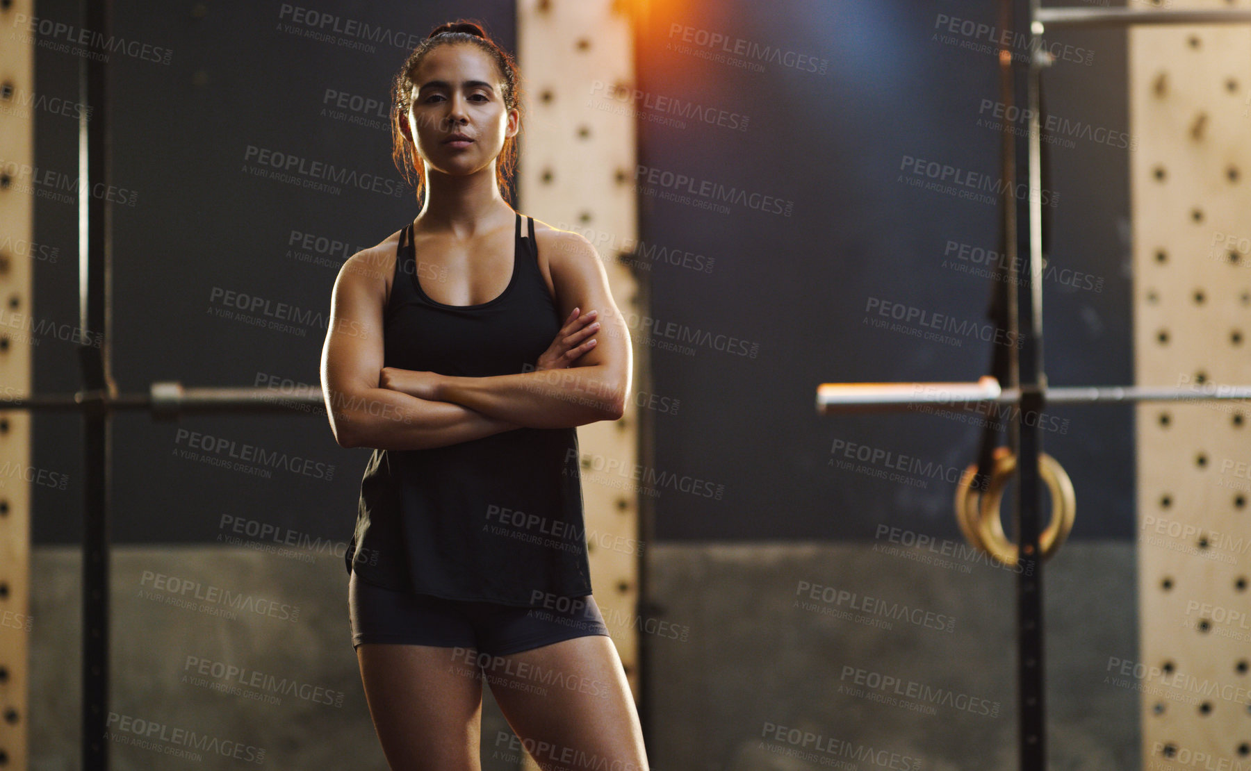 Buy stock photo Crossed arms, bodybuilder and portrait of woman in gym for training, exercise and strong workout. Fitness, muscles and serious female person in sports center for challenge, wellness and body strength