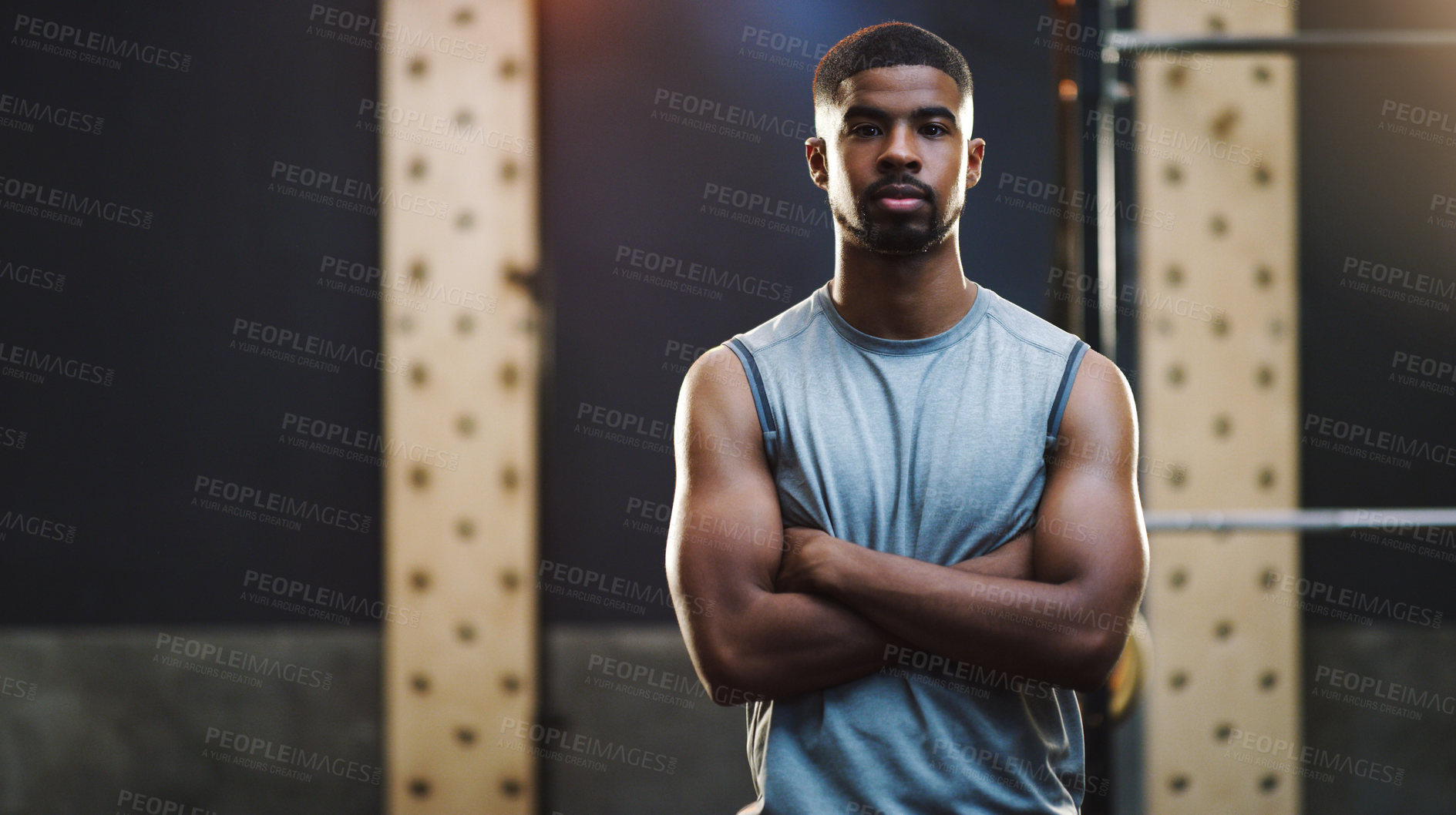 Buy stock photo Crossed arms, bodybuilder and portrait of man in gym for training, exercise and strong workout. Fitness, muscles and serious male person in sports center for challenge, wellness and body strength