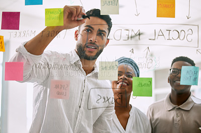 Buy stock photo Shot of businesspeople having a meeting in a boardroom at work