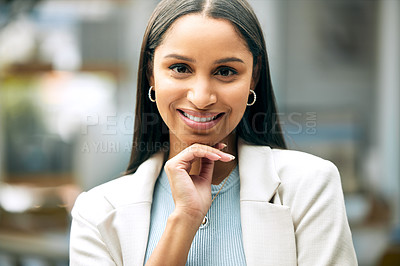 Buy stock photo Portrait shot of a young businesswoman standing in an office at work