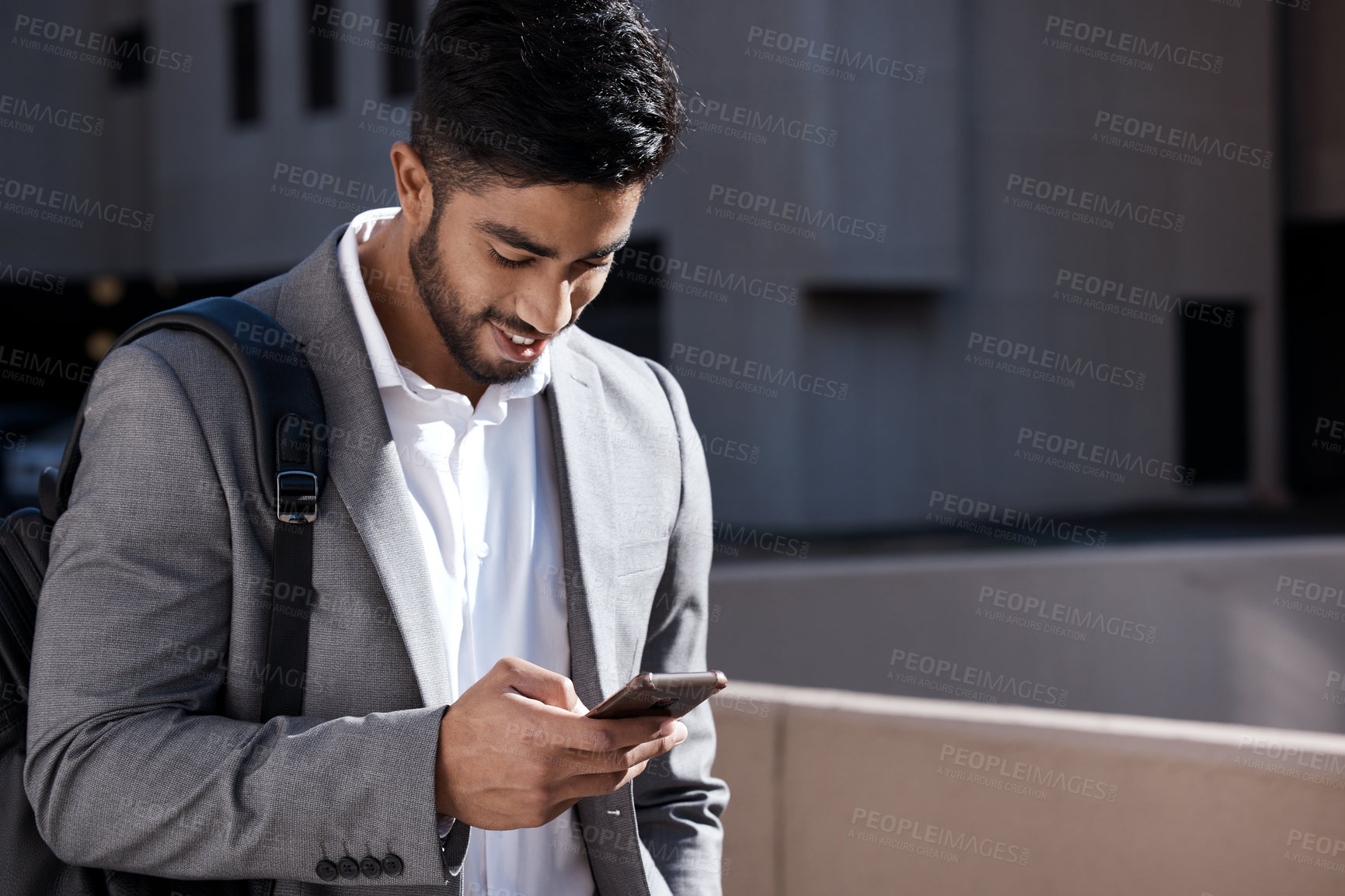 Buy stock photo Happy, city connection and a businessman with a phone for social media, chat or reading an email. Smile, typing and an employee on a mobile app for a gps or notification during a morning commute