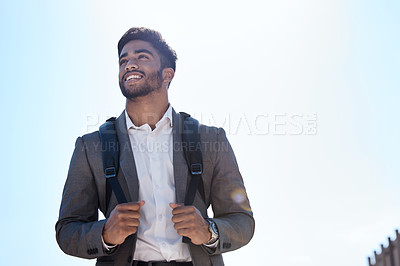 Buy stock photo Business man, backpack and walking in street, city and summer sunshine with smile with vision. Young indian businessman, outdoor and walk with happiness, thinking and professional in metro for travel