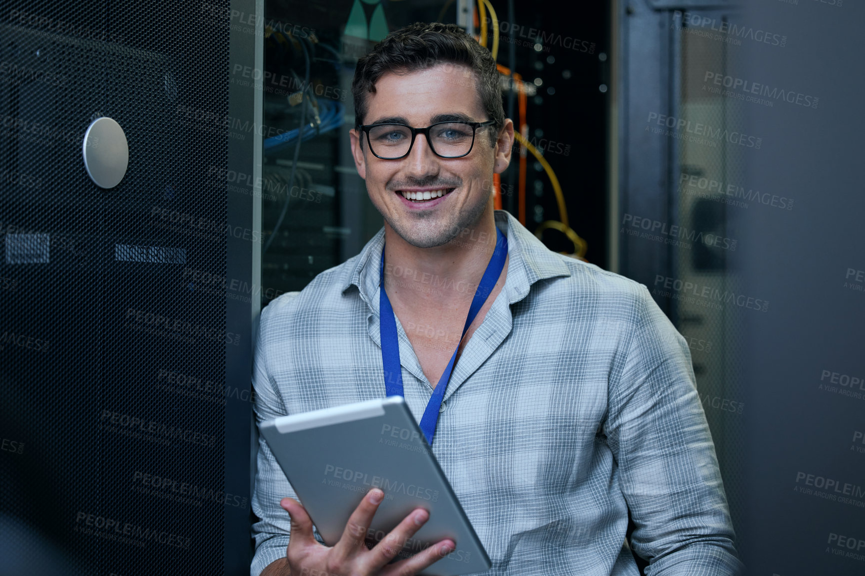 Buy stock photo Engineer, server room and portrait of a man with a tablet for programming, cybersecurity or maintenance. Technician person in a datacenter for network, software or system upgrade app with technology