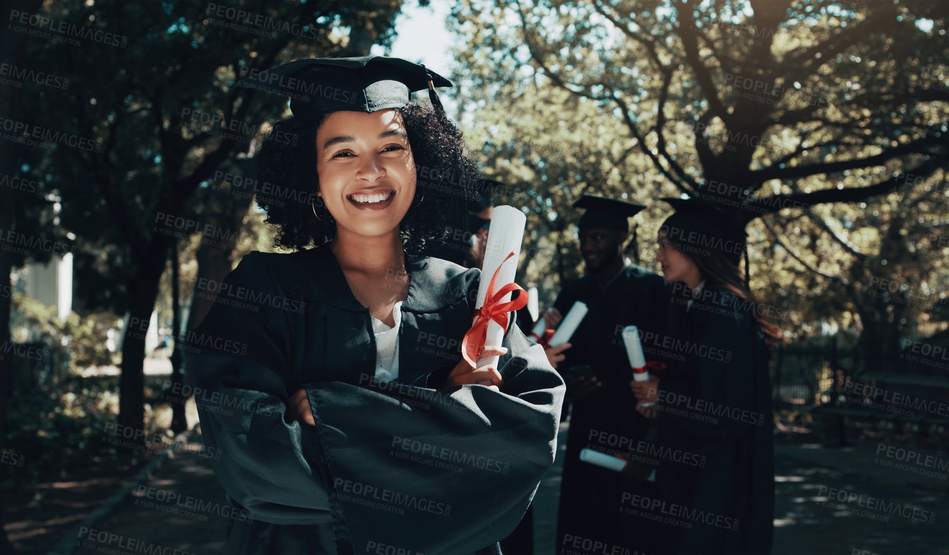 Buy stock photo Shot of a student holding her diploma on graduation day