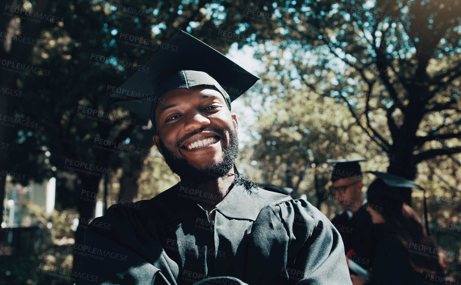 Buy stock photo Graduation, portrait and smile of black man for achievement, education and celebrate success outdoor. Happy university student, male graduate and celebration event of degree, learning goals and pride