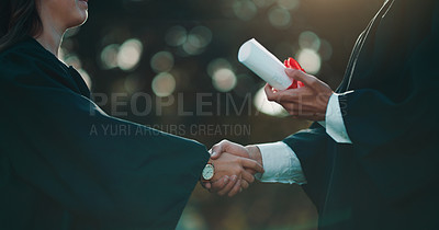 Buy stock photo Shot of a student receiving her diploma on graduation day