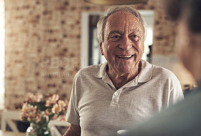 Buy stock photo Shot of a senior couple relaxing at home