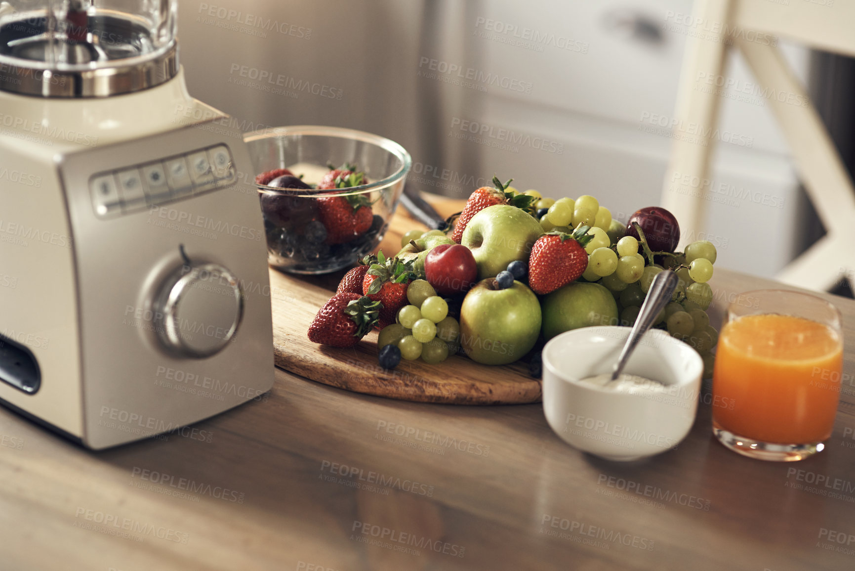 Buy stock photo Shot of a healthy breakfast on a table in the kitchen