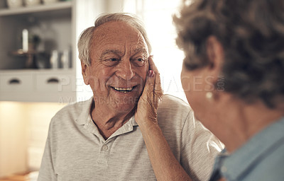 Buy stock photo Shot of a senior couple relaxing at home