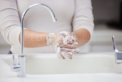 Buy stock photo Cleaning, soap and washing hands in home bathroom for hygiene, safety or health for care in the morning. Skin, person and foam for bacteria prevention, dirt or virus protection at sink in house