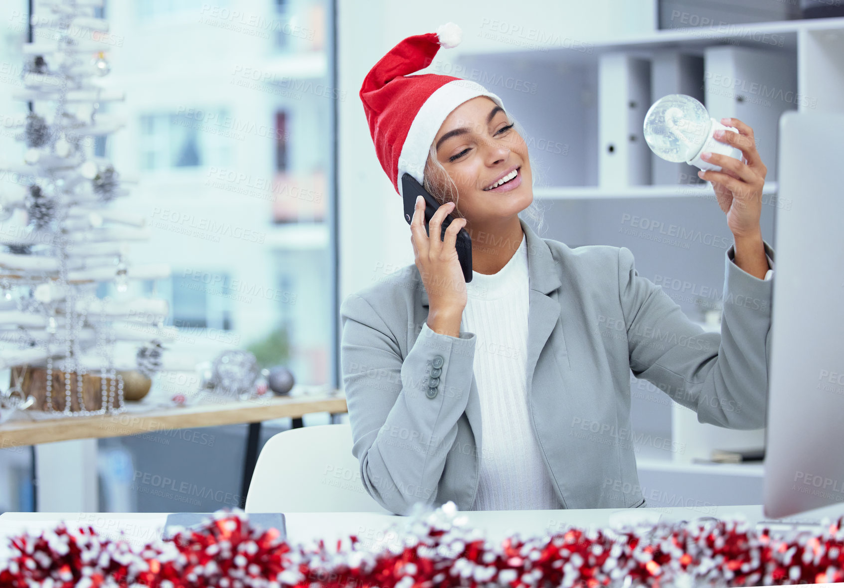Buy stock photo Phone call, businesswoman or talking on Christmas in office for communication, b2b conversation or ideas. Snow globe, computer or happy financial advisor speaking in discussion on mobile for advice