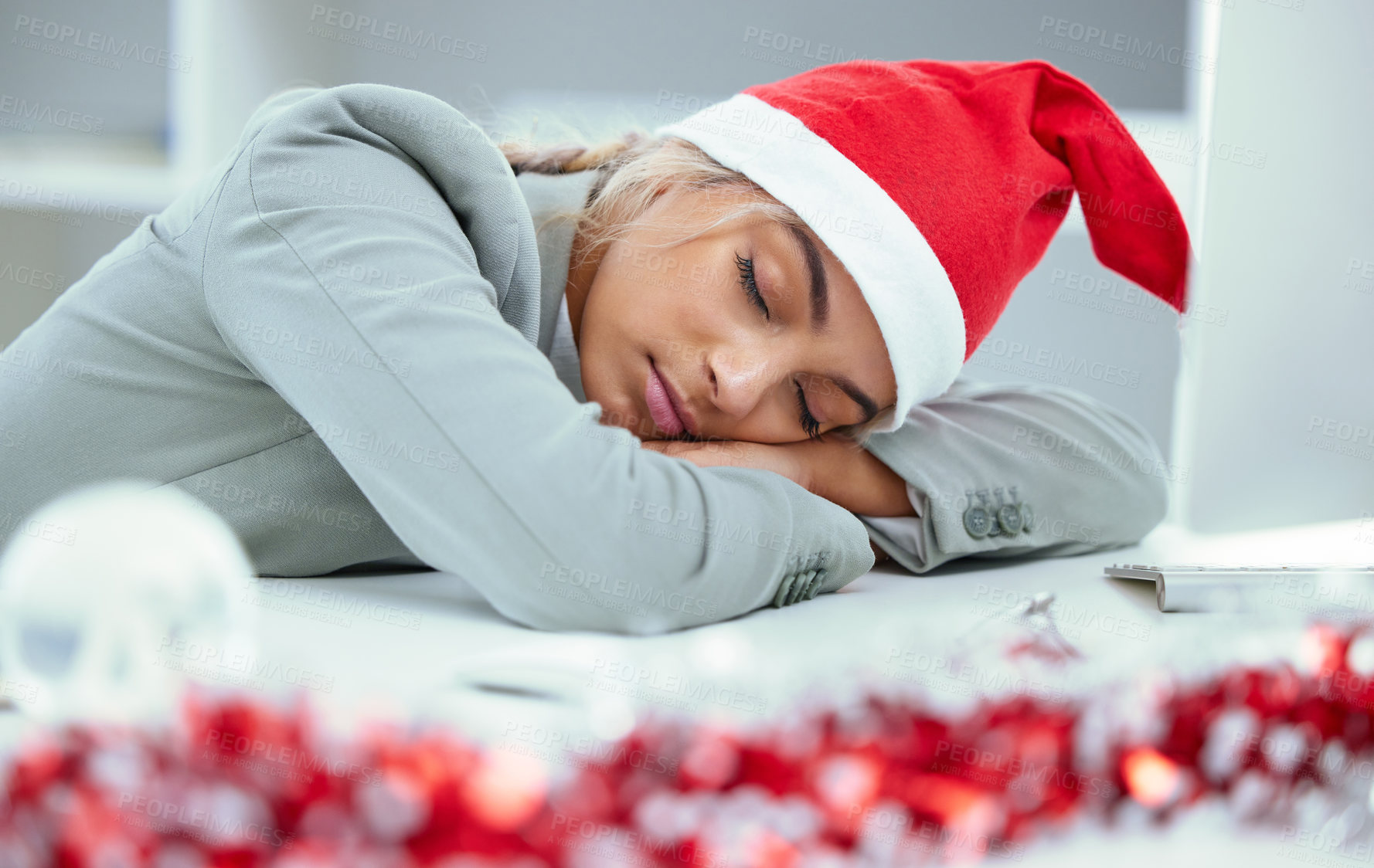 Buy stock photo Woman, tired and burnout at desk for Christmas planning, holiday and project deadline in office. Stress, exhausted and financial advisor in workplace for investment, research and sleep on table