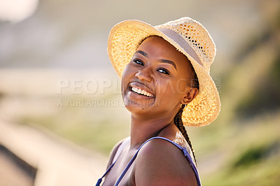 Buy stock photo Portrait of a beautiful young woman enjoying alone time at the beach