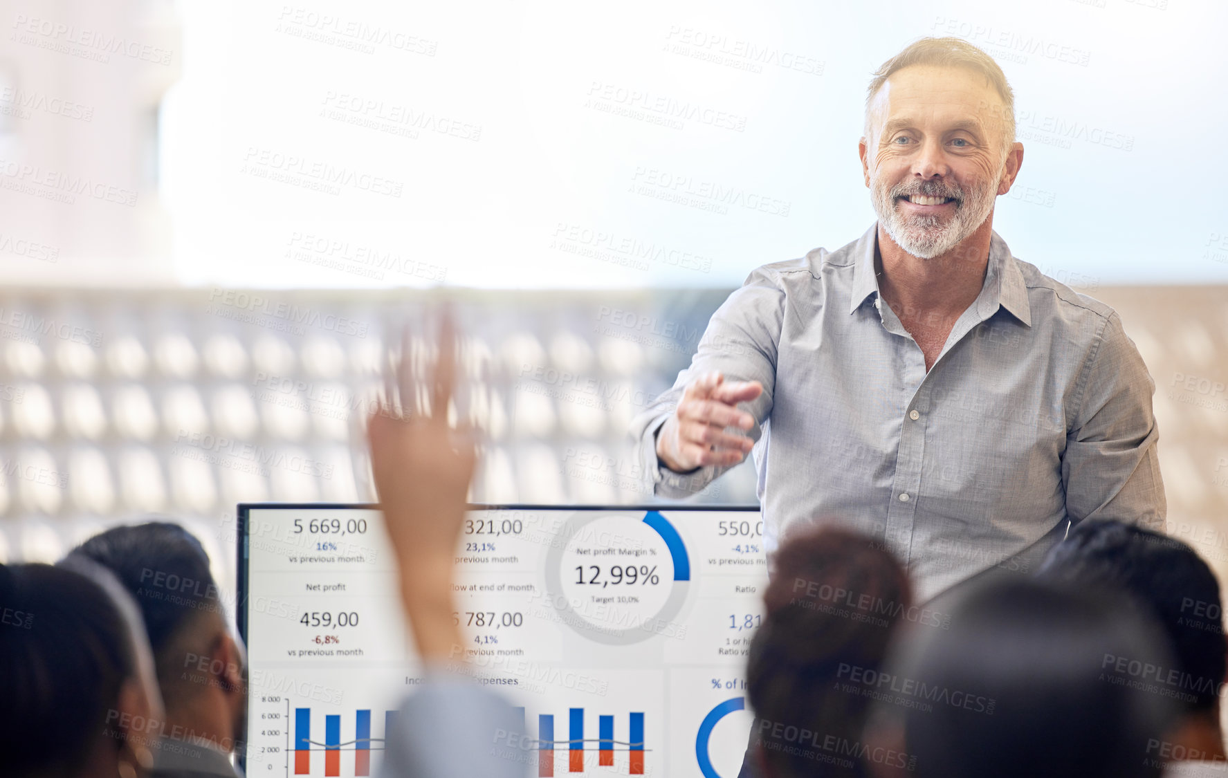 Buy stock photo Mature, businessman and finance presentation in conference room with bar graphs for revenue or investment analysis and profit. Man, meeting and screen with financial statistics, data and earnings.