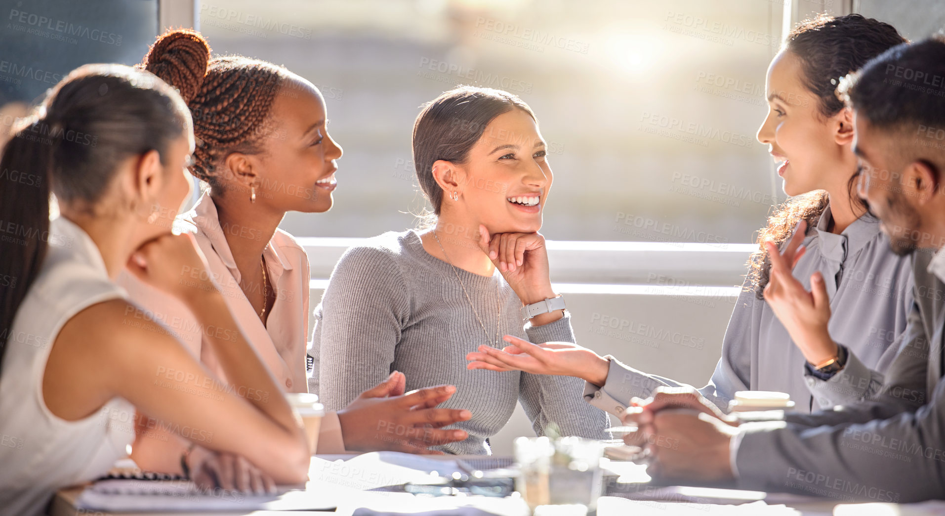 Buy stock photo Shot of a group of businesspeople having a meeting in an office