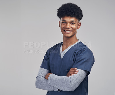 Buy stock photo Shot of a medical practitioner standing against a grey background