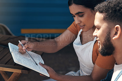 Buy stock photo Shot of two a businessman planning for the day with his staff