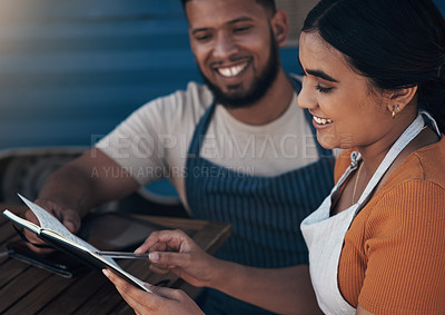 Buy stock photo Shot of two a businessman planning for the day with his staff