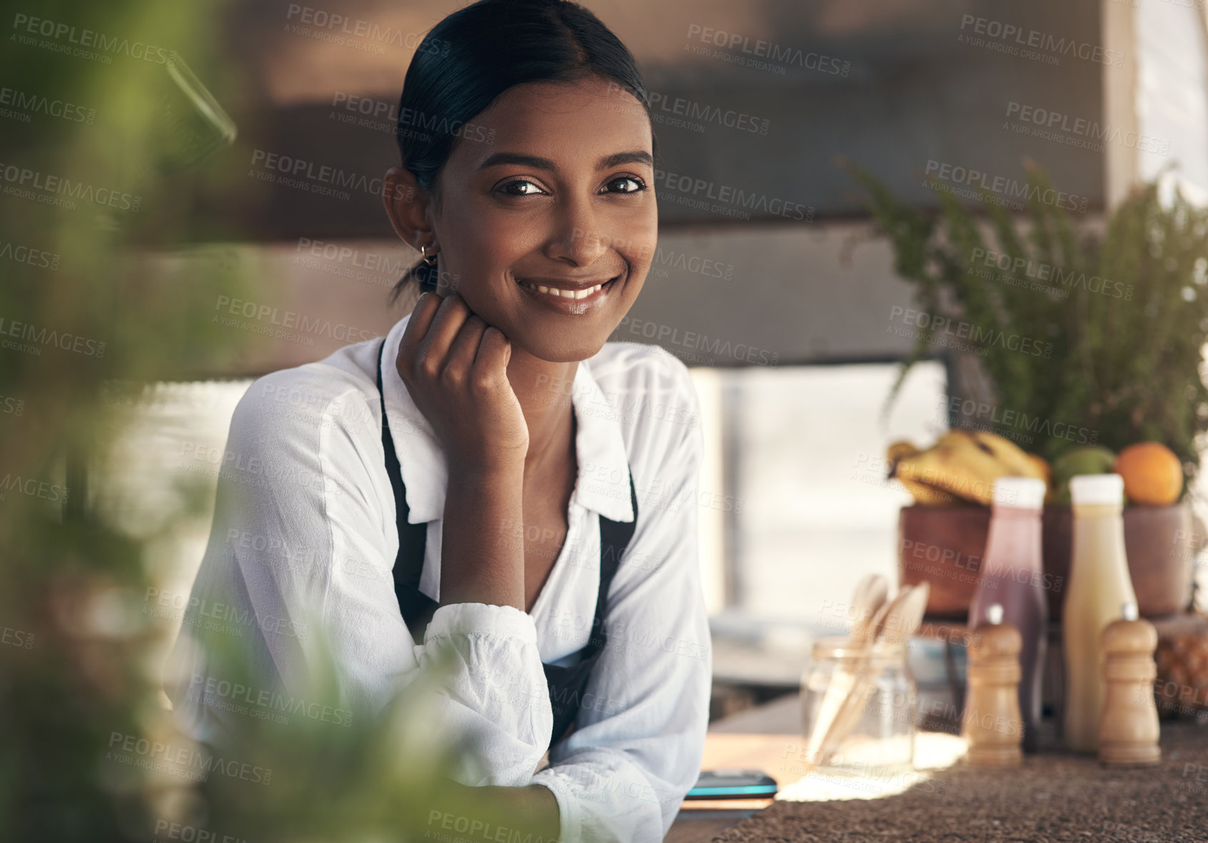 Buy stock photo Shot of a young businesswoman at work